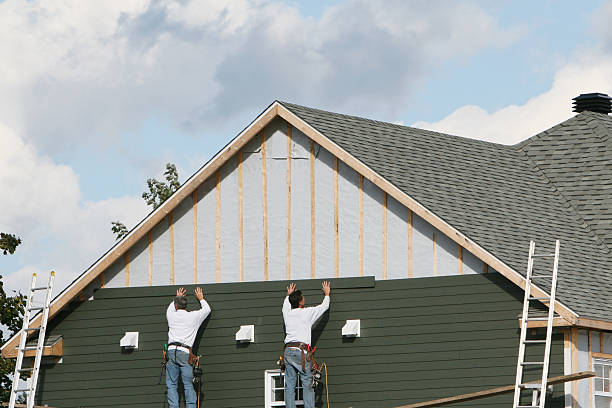 Professional Siding Installation technician working in Linden, NC
